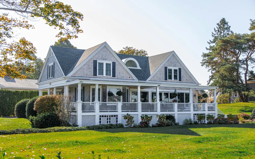Two-story home with a wraparound porch